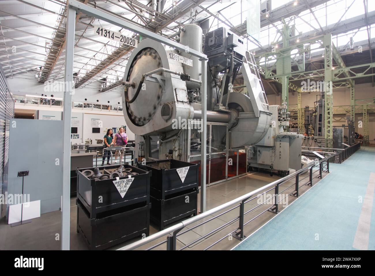 Inside the Toyota Commemorative Museum of Industry and Technology in Nagoya, Japan.with heavy machinery used in car manufacture in the past. Stock Photo