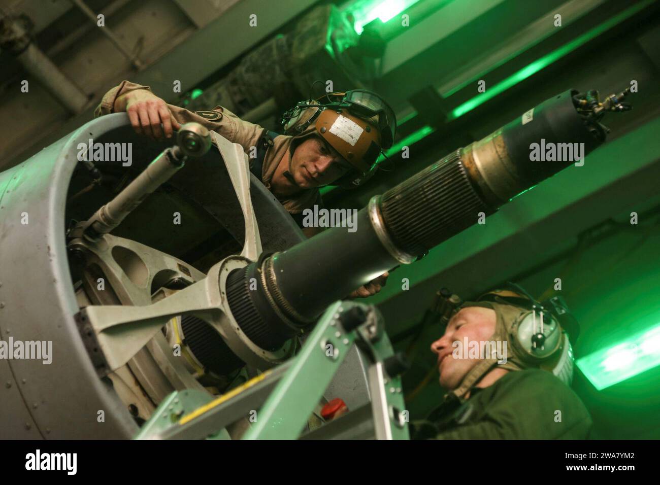 US military forces. 160810AF202-015 MEDITERRANEAN SEA (Aug. 10, 2016) Marines assigned to Marine Medium Tiltrotor Squadron 264 (Reinforced), 22nd Marine Expeditionary Unit (MEU), conduct maintenance on an MV-22B Osprey aboard the amphibious assault ship USS Wasp (LHD 1) on Aug. 10, 2016. 22nd MEU, deployed with the Wasp Amphibious Ready Group, is conducting naval operations in the 6th Fleet area of operations in support of U.S. national security interests in Europe and Africa. (U.S. Marine Corps photo by Lance Cpl. Koby I. Saunders/Released) Stock Photo