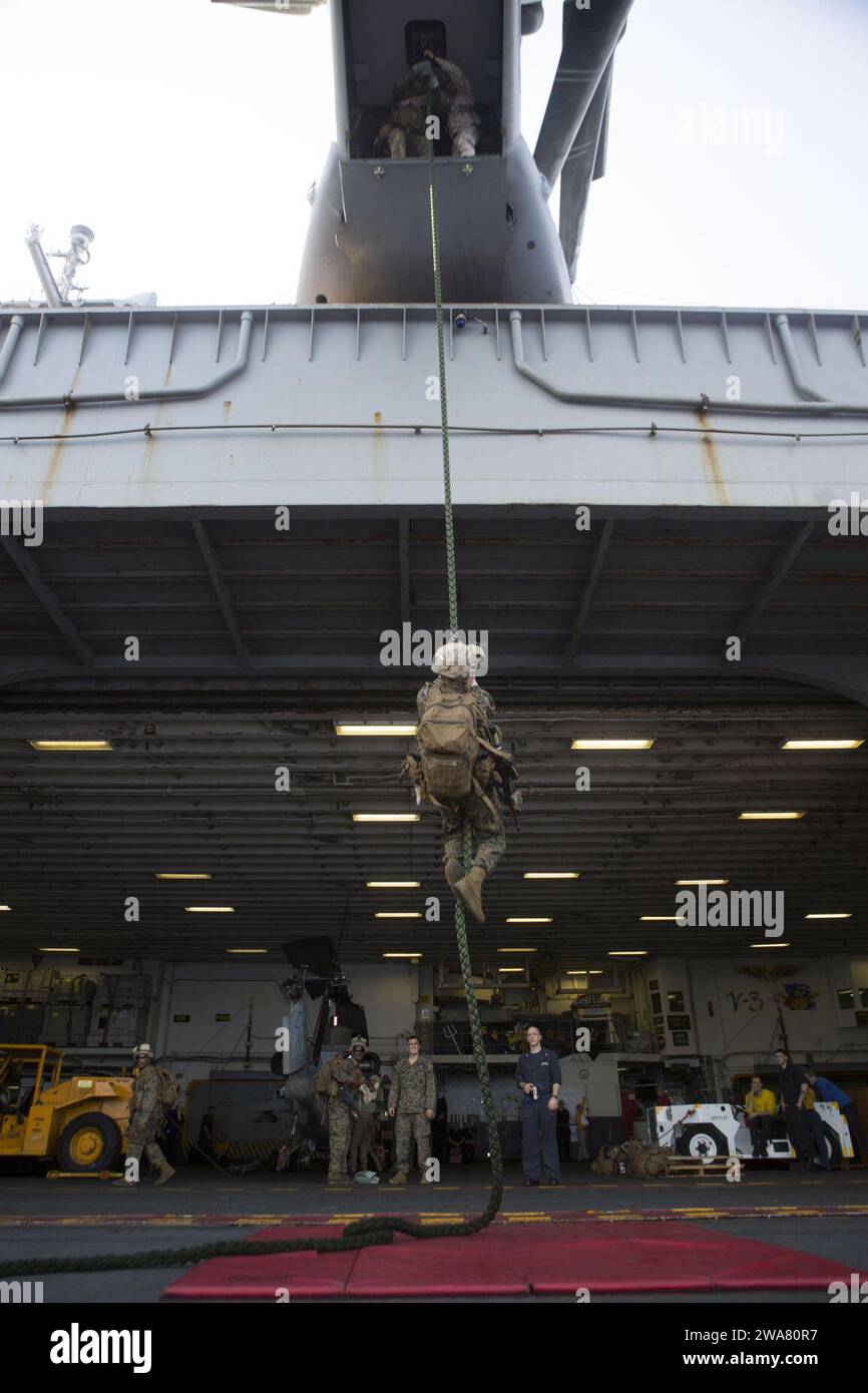 US military forces. 160903MK246-082 MEDITERRANEAN SEA (Sept. 3, 2016) Marines assigned to Alpha Company, Battalion Landing Team, 1st Battalion, 6th Marine Regiment, 22nd Marine Expeditionary Unit (MEU), conduct fast rope training aboard the amphibious assault ship USS Wasp (LHD 1) Sept. 3, 2016. The 22nd MEU, deployed with the Wasp Amphibious Ready Group, is conducting naval operations in the U.S. 6th Fleet area of operations in support of U.S. national security interests in Europe and Africa. (U.S. Marine Corps photo by Cpl. John A. Hamilton Jr.) Stock Photo