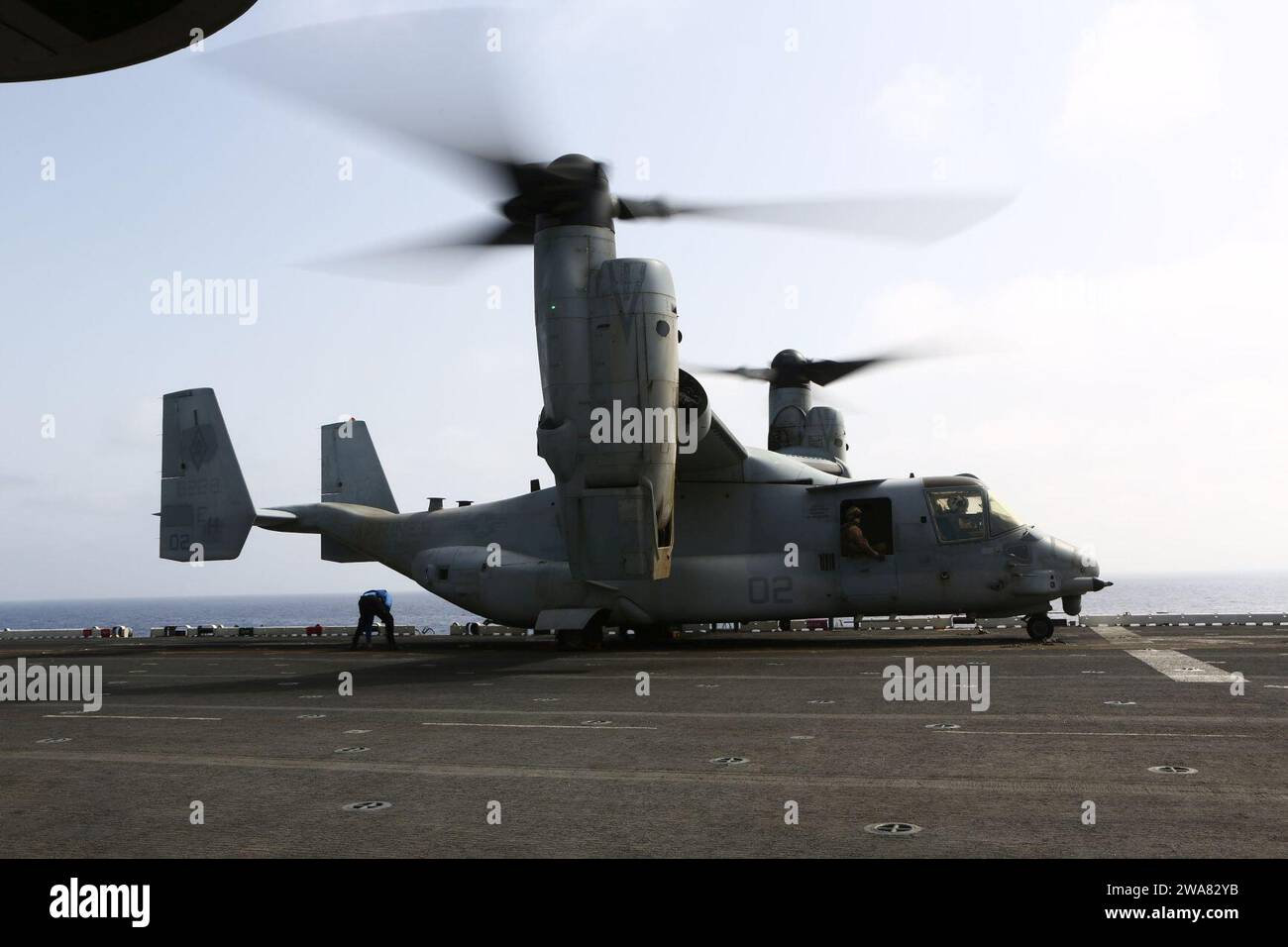 US military forces. 161008MK246-004 MEDITERRANEAN SEA (Oct. 8, 2016) An MV-22B Osprey with Marine Medium Tiltrotor Squadron 264 (Reinforced), 22nd Marine Expeditionary Unit (MEU), prepares for flight operations on the flight deck of the amphibious assault ship USS Wasp (LHD 1) on Oct. 8, 2016. The 22nd MEU, deployed with the Wasp Amphibious Ready Group, is conducting naval operations in support of U.S. national security interests in Europe. (U.S. Marine Corps photo by Cpl. John A. Hamilton Jr.) Stock Photo