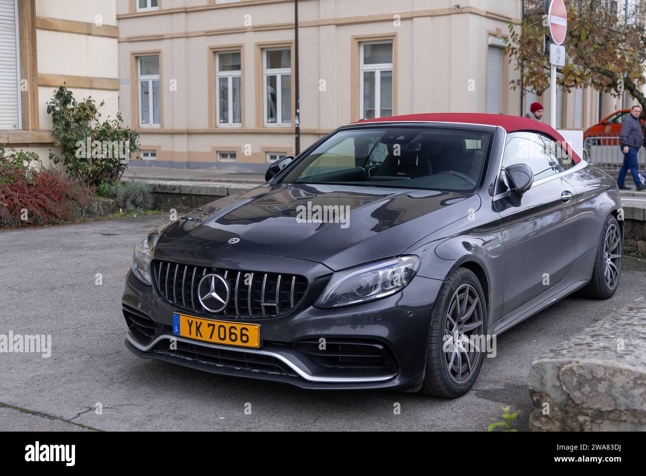 Luxembourg City, Luxembourg - Black Mercedes-AMG C 63 Cabriolet parked in a street. Stock Photo