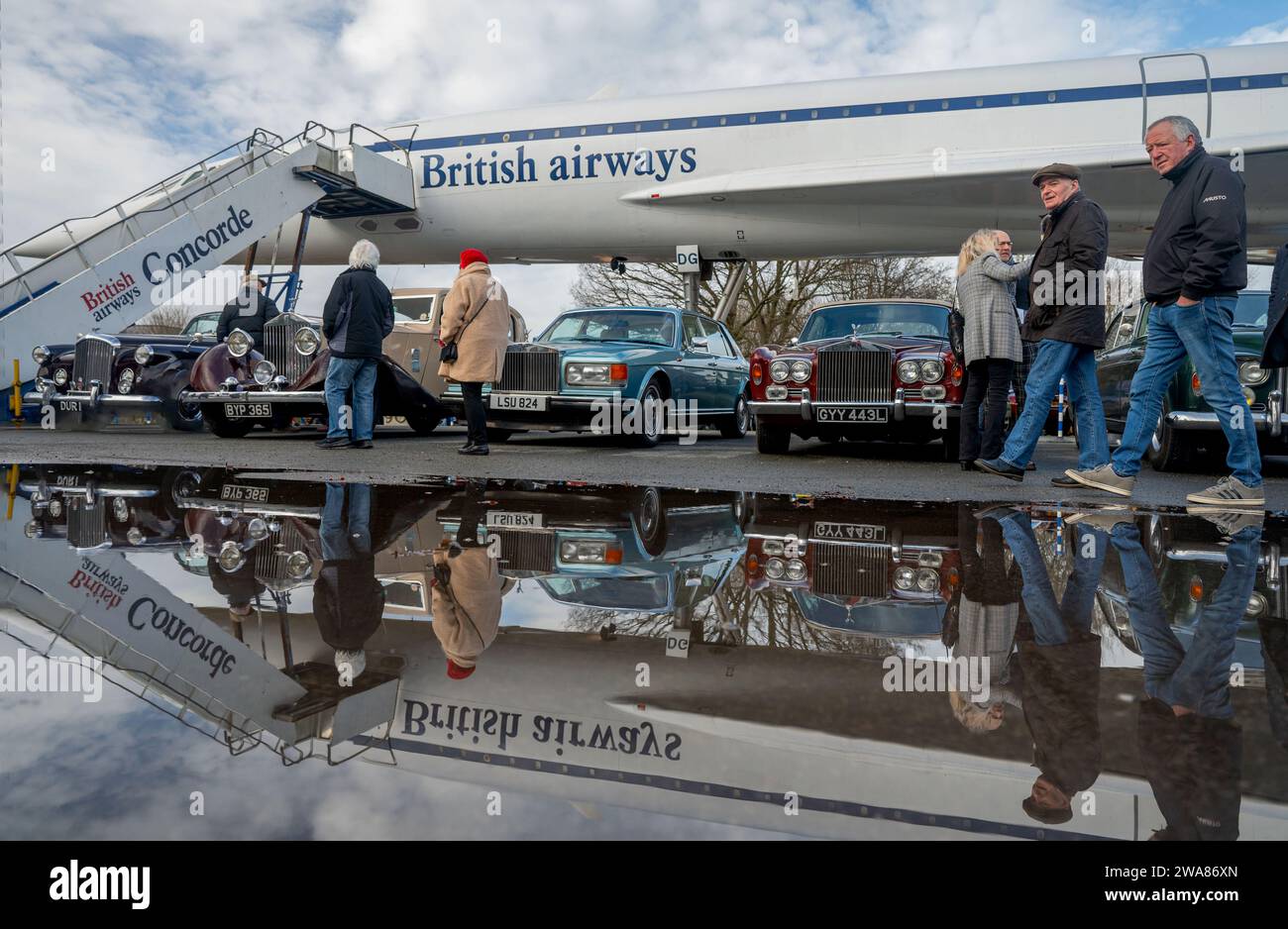 Classic cars and vistors around Concorde at Brooklands New Years Day show, 2024 Stock Photo