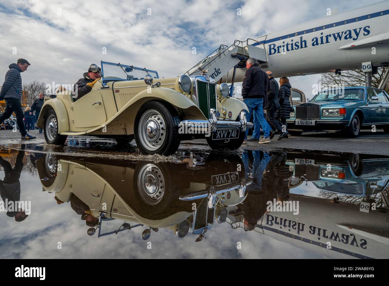 MG TD classic car passes Concorde at Brooklands New Years Day show