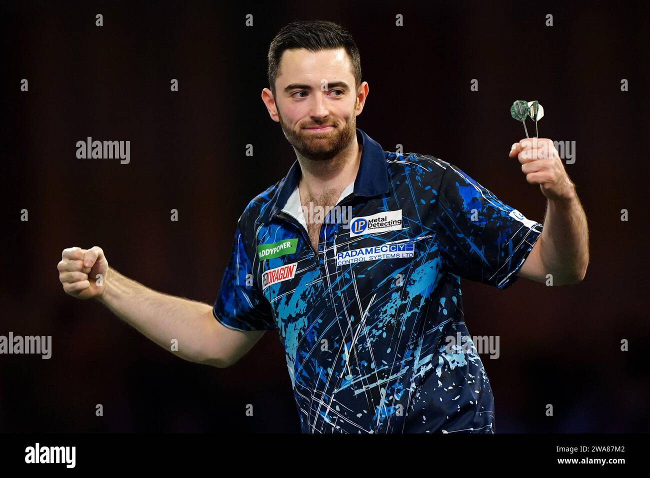 Luke Humphries celebrates victory over Scott Williams (not pictured) on