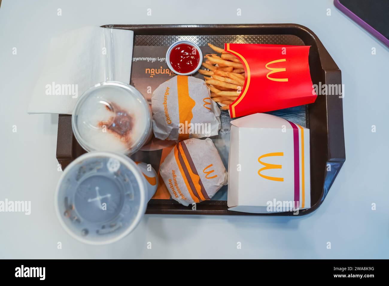 McDonald's is an American chesseburger and fast food restaurant chain. The McDonald's logo has branches around the world. Thailand, Bangkok 22 decembe Stock Photo
