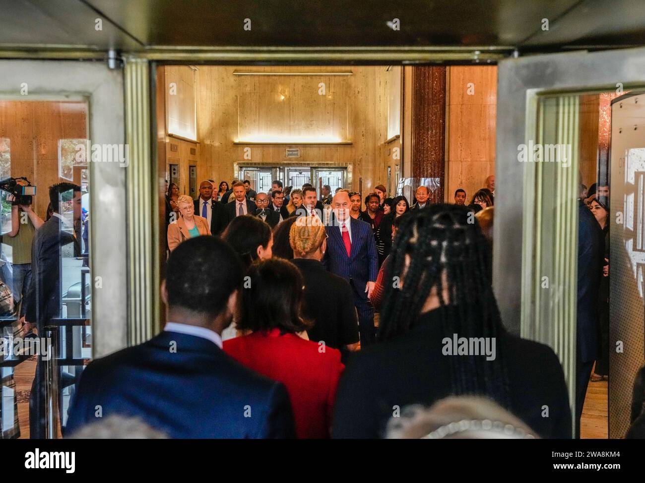 People wait in line to shake hands with new Mayor John Whitmire at