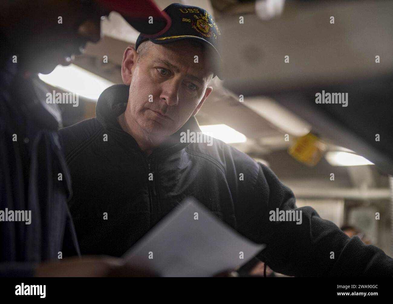 US military forces. 180126RG482-233 MEDITERRANEAN SEA (Jan. 26, 2018) Damage Controlman 2nd Class Anthony Monroe, left, performs a maintenance spot check on the integrated point detection system with Capt. Tate Westbrook, commodore, Destroyer Squadron 60, aboard the Arleigh Burke-class guided-missile destroyer USS Ross (DDG 71) Jan. 26, 2018. Ross, forward-deployed to Rota, Spain, is on its sixth patrol in the U.S. 6th Fleet area of operations in support of regional allies and partners and U.S. national security interests in Europe. (U.S. Navy photo by Mass Communication Specialist 1st Class K Stock Photo