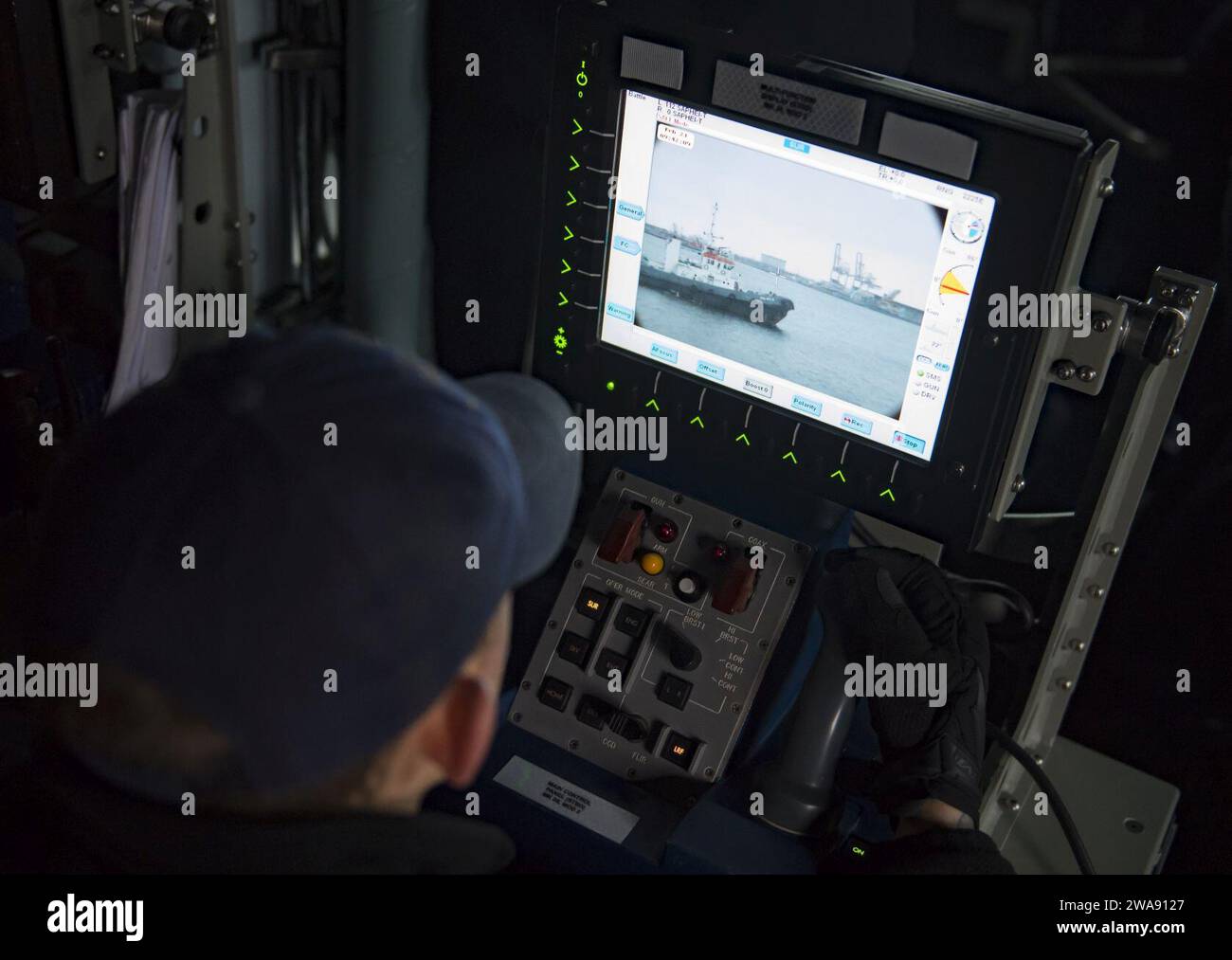 US military forces. 180221RG482-111  CONSTANTA, Romania (Feb. 21, 2018) Gunner's Mate 2nd Class Tre Fry mans the remote console that controls a 25 mm gun aboard the Arleigh Burke-class, guided-missile destroyer USS Ross (DDG 71) as the ship gets underway from Constanta, Romania, Feb. 21, 2018. Ross, forward-deployed to Rota, Spain, is on its sixth patrol in the U.S. 6th Fleet area of operations in support of regional allies and partners and U.S. national security interests in Europe. (U.S. Navy photo by Mass Communication Specialist 1st Class Kyle Steckler/Released) Stock Photo