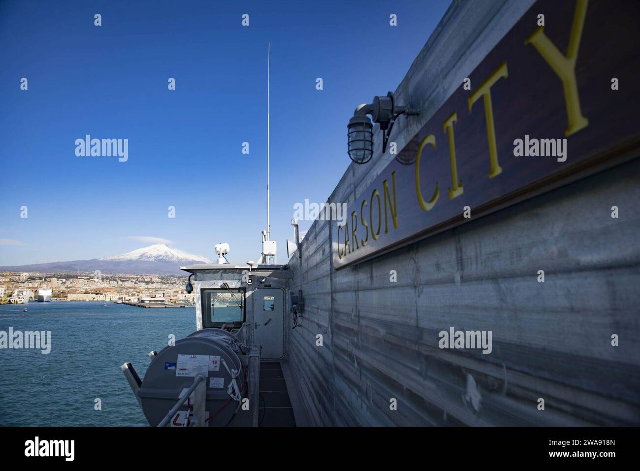 US military forces. 180307JI086-109 CATANIA, Italy (March 7, 2018) The Spearhead-class expeditionary fast transport ship USNS Carson City (T-EPF 7) arrives in Catania, Italy, March 7, 2018. Carson City is conducting naval operations in the U.S. 6th Fleet area of operations to advance security and stability in the region. (U.S. Navy photo by Mass Communication Specialist 3rd Class Ford Williams/Released) Stock Photo