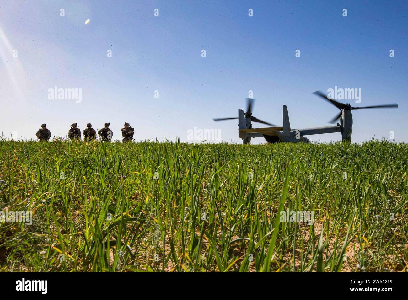 US military forces. 20180314-CA957-0007 HAIFA, Israel (March 14, 2018) U.S. Marines assigned to the Tactical Recovery of Aircraft Personnel (TRAP) team, 26th Marine Expeditionary Unit (MEU), arrive in a landing zone of an MV-22B Osprey aircraft to conduct a simulated search mission in Haifa, Israel, during exercise Juniper Cobra 2018 March 14, 2018. Juniper Cobra is a computer-assisted exercise conducted through computer simulations focused on improving combined missile defense capabilities and overall interoperability between the U.S. European Command and Israel Defense Force.(U.S. Marine Cor Stock Photo