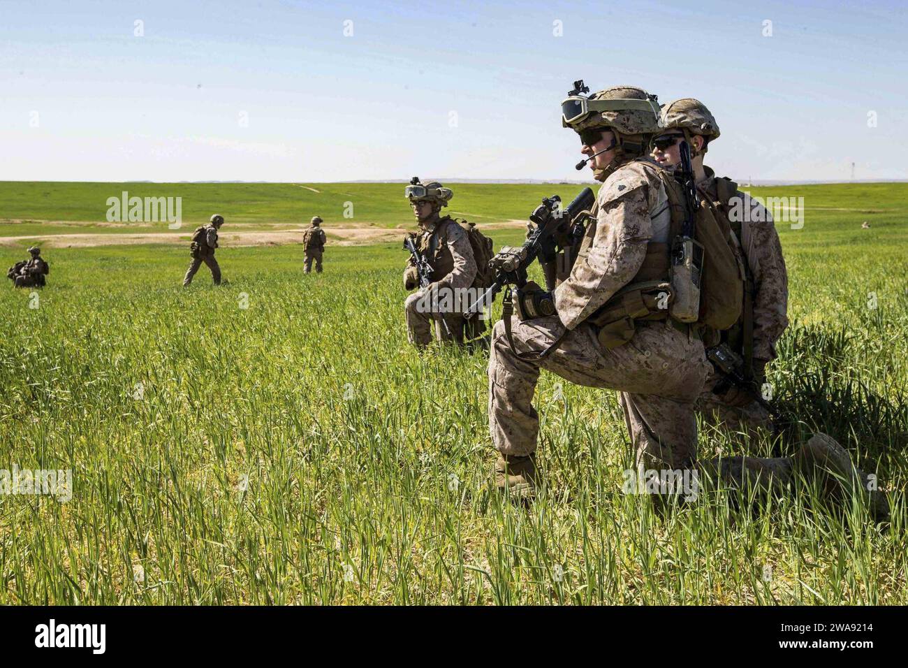 US military forces. 20180314-CA957-0042 HAIFA, Israel (March 14, 2018) U.S. Marines assigned to the Tactical Recovery of Aircraft Personnel (TRAP) team, 26th Marine Expeditionary Unit (MEU), pause to relay information during a simulated search mission in Haifa, Israel, during exercise Juniper Cobra 2018 March 14, 2018. Juniper Cobra is a computer-assisted exercise conducted through computer simulations focused on improving combined missile defense capabilities and overall interoperability between the U.S. European Command and Israel Defense Force. (U.S. Marine Corps photo by Lance Cpl. Tojyea Stock Photo