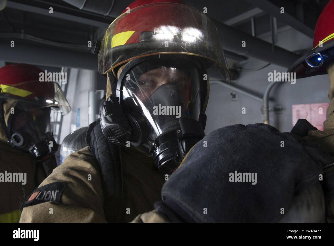 US military forces. 180421ZH683-166 ATLANTIC OCEAN (Apr. 21, 2018) Aviation Machinist's Mate Airman Brandon Parmalee mans a fire team on a weather deck during a general quarters drill aboard USS Harry S. Truman (CVN 75). Truman is currently deployed as part of an ongoing rotation of U.S. forces supporting maritime security operations in international waters around the globe. (U.S. Navy photo by Mass Communication Specialist 3rd Class Juan Sotolongo/Released) Stock Photo