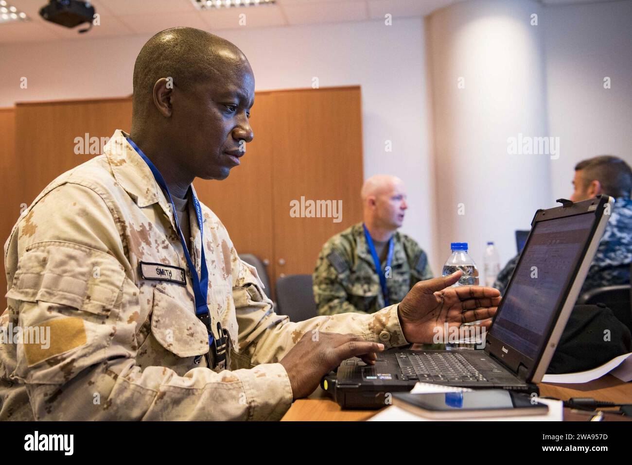 US military forces. 180502UY653-037  SOUDA BAY, Greece (May 2, 2018) Royal Canadian Navy Lt. Cmdr. Paul Smith conducts pre exercise planning during exercise Phoenix Express 2018, May 2. Phoenix Express is sponsored by U.S. Africa Command and facilitated by U.S. Naval Forces Europe-Africa/U.S. 6th Fleet, and is designed to improve regional cooperation, increase maritime domain awareness information sharing practices, and operational capabilities to enhance efforts to achieve safety and security in the Mediterranean Sea. (U.S. Navy photo by Mass Communication Specialist 2nd Class Ryan U. Kledzik Stock Photo