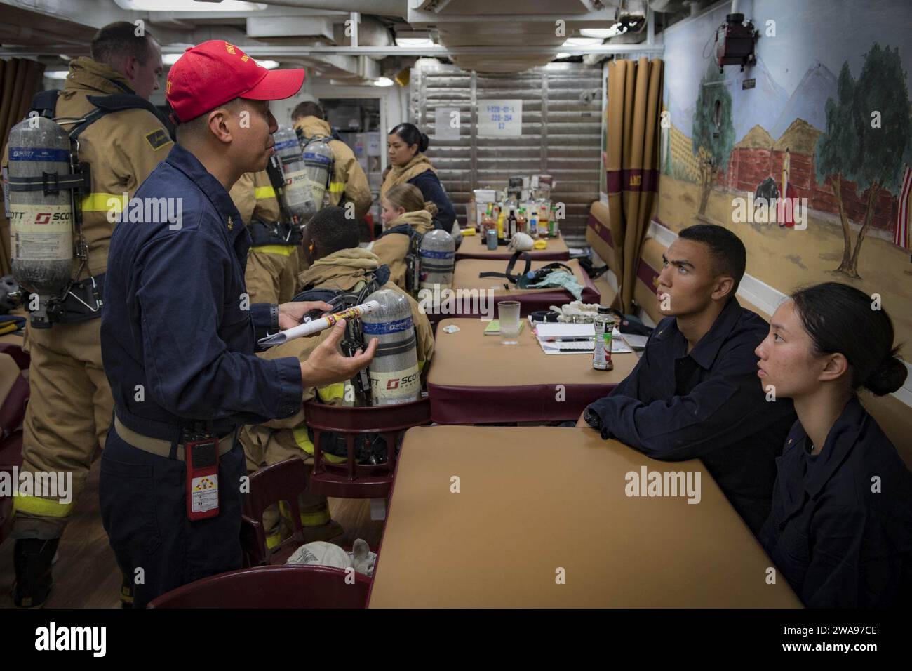 US military forces. 180518JI086-474 MEDITERRANEAN SEA (May 18, 2018) Senior Chief Machinist's Mate Jonathan Sarmiento, assigned to the Arleigh Burke-class guided-missile destroyer USS Porter (DDG 78), gives training to midshipmen during a general quarters drill, May 18, 2018. Porter, forward-deployed to Rota, Spain, is on its fifth patrol in the U.S. 6th Fleet area of operations in support of U.S. national security interests in Europe and Africa. (U.S. Navy photo by Mass Communication Specialist 3rd Class Ford Williams/Released) Stock Photo