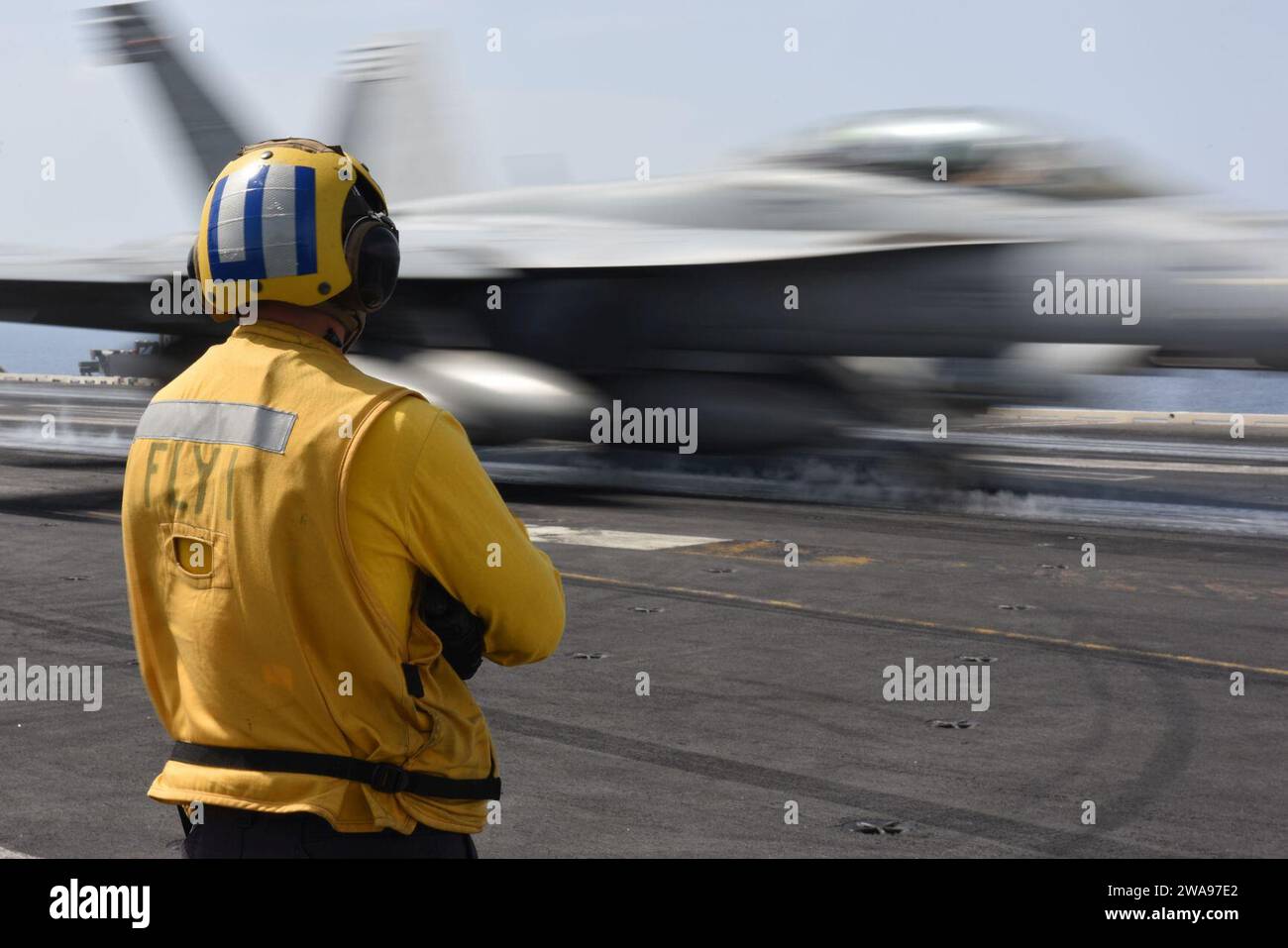 US military forces. 180519EA818-0188 MEDITERRANEAN SEA (May 19, 2018) Aviation Boatswain's Mate (Handling) 2nd Class Phillip Tolaro observes as an F/A-18F Super Hornet, assigned to the ТFighting CheckmatesУ of Strike Fighter Squadron (VFA) 211, launches from the flight deck aboard the Nimitz-class aircraft carrier USS Harry S. Truman (CVN 75). As the Carrier Strike Group 8 flag ship, Truman's support of Operation Inherent Resolve demonstrates the capability and flexibility of U.S. Naval Forces, and its resolve to eliminate the terrorist group ISIS and the threat it poses. (U.S. Navy photo by M Stock Photo