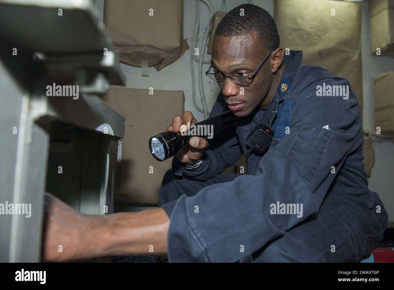 US military forces. 180519MK318-0106 MEDITERRANEAN SEA (May 19, 2018) Chief Damage Controlman Damarcus McCoy inspects an Aqueous Film Forming Foam (AFFF) station aboard the Nimitz-class aircraft carrier USS Harry S. Truman (CVN 75). As the Carrier Strike Group 8 flag ship, Truman's support of Operation Inherent Resolve demonstrates the capability and flexibility of U.S. Naval Forces, and its resolve to eliminate the terrorist group ISIS and the threat it poses. (U.S. Navy photo by Mass Communication Specialist 3rd Class Victoria Granado/Released) Stock Photo