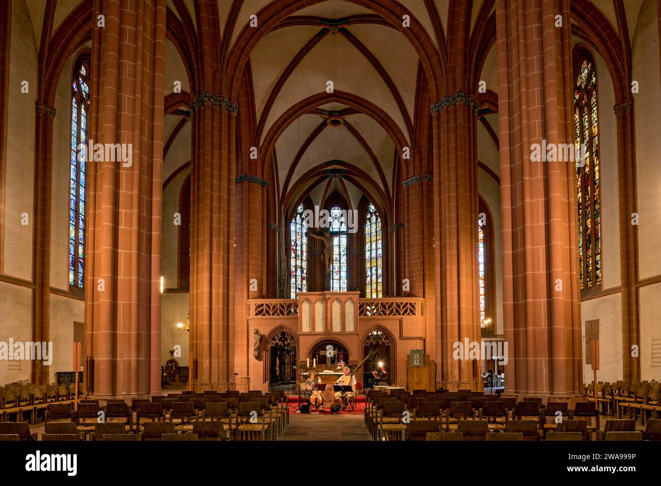 Church of Our Lady, Gothic hall church, interior, nave with cross vault, arcades, altar, rood screen, musicians rehearse for concert, Old Town, Friedb Stock Photo