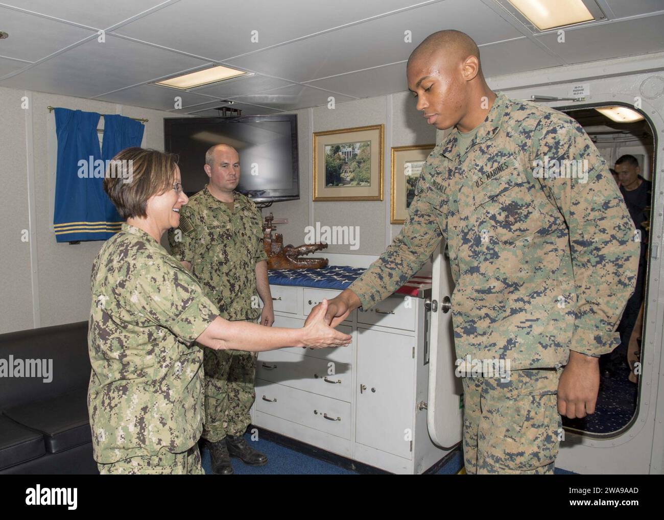 US military forces. 180604PC620-0769 BALTIC SEA (June 4, 2018) Cpl. Rael Pascall, assigned to the 26th Marine Expeditionary Unit, receives a coin from Vice Adm. Lisa M. Franchetti, commander of the U.S. 6th Fleet and commander of Naval Striking and Support Forces Nato, for being Marine in the spotlight aboard the Harpers Ferry-class dock landing ship USS Oak Hill (LSD 51), during BALTOPS 2018 June 4, 2018. BALTOPS is the premier annual maritime-focused exercise in the Baltic region and one of the largest exercises in Northern Europe enhancing flexibility and interoperability among allied and p Stock Photo