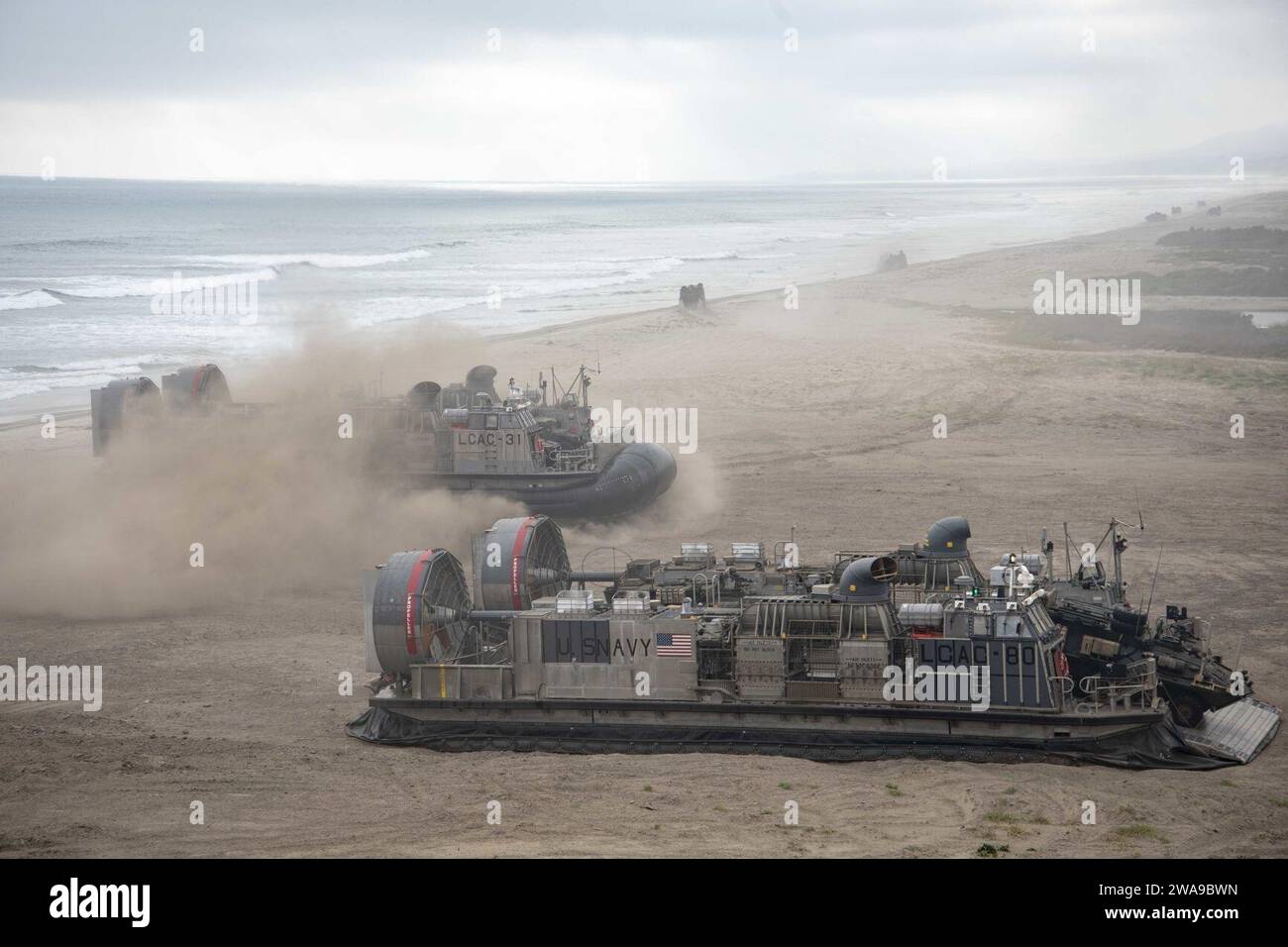 US military forces. 180613RP442-036 CAMP PENDLETON, Calif. (June 13, 2018) Landing craft, air cushions assigned to Assault Craft Unit (ACU) 5 land on the beaches of Camp Pendleton, Calif., during a composite training unit exercise (COMPTUEX). COMPTUEX is the final pre-deployment exercise that certifies the combined Essex Amphibious Ready Group (ARG) and 13th Marine Expeditionary Unit's (MEU) abilities to conduct military operations at sea and project power ashore during their upcoming deployment. Stock Photo