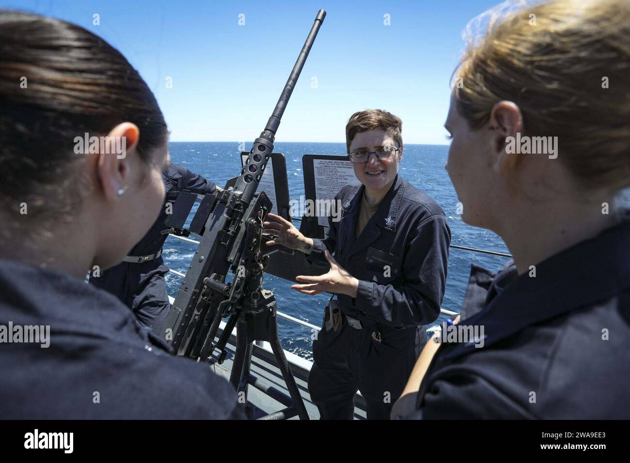 US military forces. 180701XT273-154 MEDITERRANEAN SEA (July 1, 2018) Gunner’s Mate 2nd Class Christina Nichols  trains Sailors and U.S. Naval Academy midshipmen on .50-caliber machine gun maintenance aboard the Blue Ridge-class command and control ship USS Mount Whitney (LCC 20) in the Mediterranean Sea, July 1, 2018. Mount Whitney, forward-deployed to Gaeta, Italy, operates with a combined crew of U.S. Navy Sailors and Military Sea Lift Command civil service mariners. (U.S. Navy photo by Mass Communication Specialist 1st Class Justin Stumberg/Released) Stock Photo