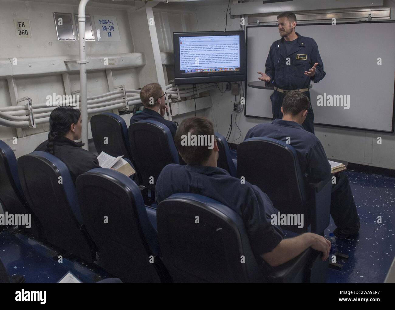 US military forces. 180708IC246-0005 MEDITERRANEAN SEA (July 8, 2018) Lt. Aaron Chicoine gives a sermon aboard guided-missile destroyer USS Arleigh Burke (DDG 51). With the aircraft carrier USS Harry S. Truman (CVN 75) as the flagship, deploying strike group assists include staffs, ships, and aircraft of Carrier Strike Group (CSG) 8, Destroyer Squadron (DESRON) 28 and Carrier Air Wing (CVW) 1; as well as Sachen-class German Frigate FGS Hessen (F 221). (U.S. Navy photo by Mass Communication Specialist Seaman Raymond Maddocks/Released) Stock Photo