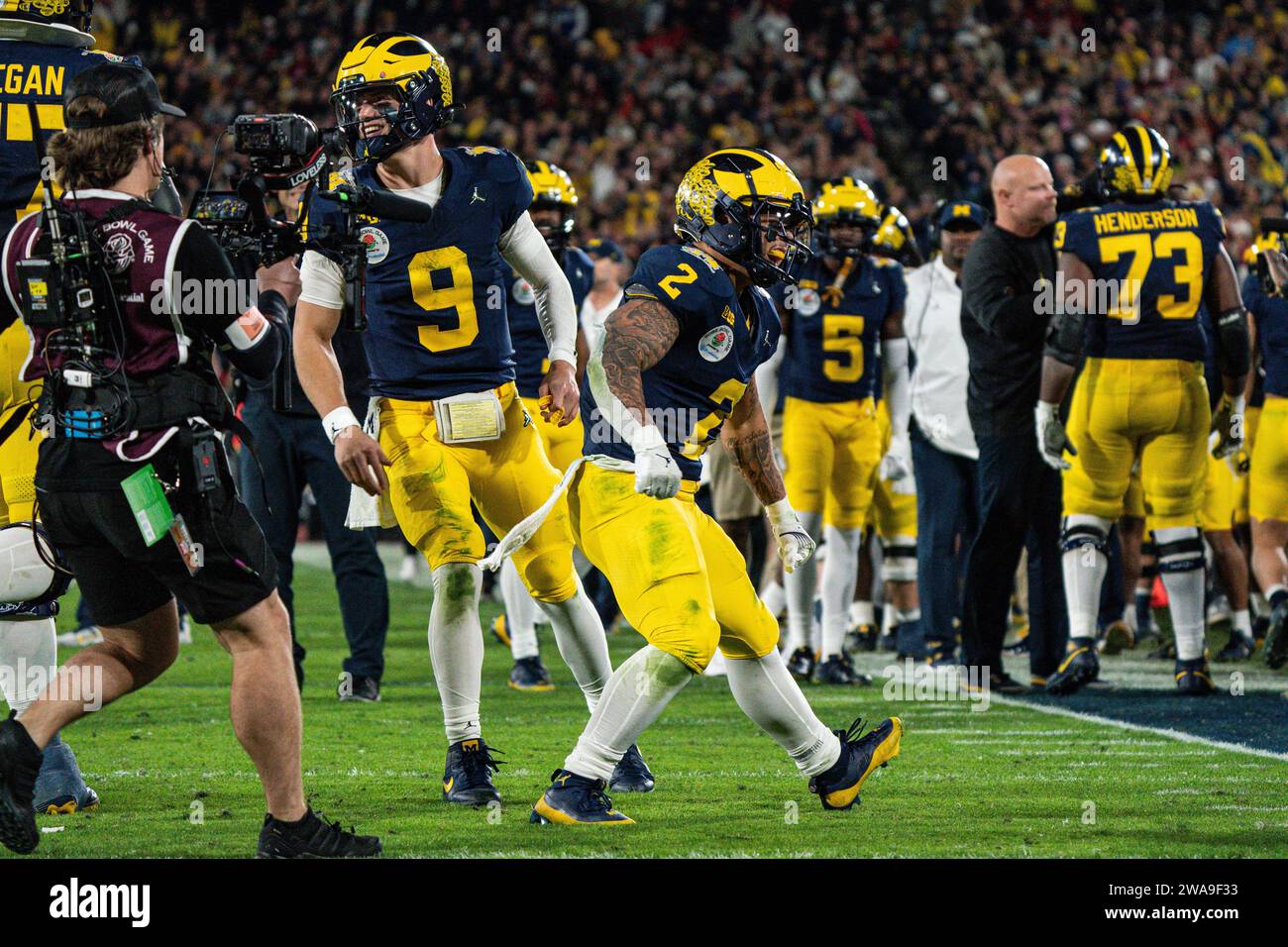 Michigan Wolverines running back Blake Corum (2) celebrates the winning touchdown during overtime of the CFP Semifinal at the Rose Bowl Game against t Stock Photo