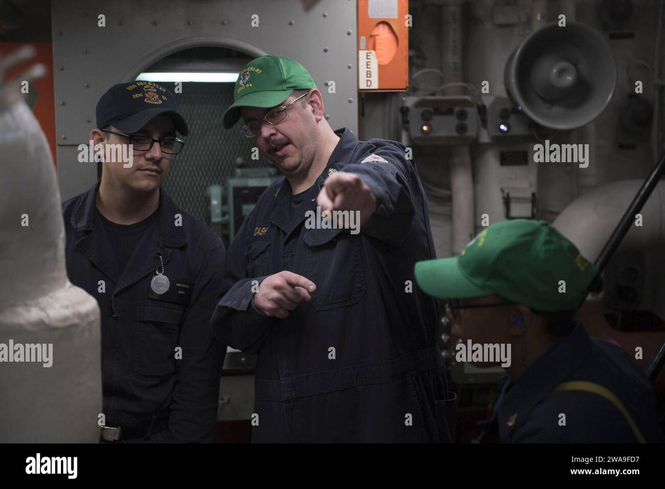 US military forces. 180807EV253-004 ATLANTIC OCEAN (Aug. 7, 2018) Chief Gas Turbine Systems Technician (Electrical) Michael Bocash, right, provides training to Hull Maintenance Technician Fireman Apprentice Adrian Mendez during engineering drills aboard the Arleigh Burke-class guided-missile destroyer USS Bulkeley (DDG 84) Aug. 7, 2018. Bulkeley, homeported at Naval Station Norfolk, is conducting naval operations in the U.S. 6th Fleet area of operations in support of U.S. national security interests in Europe and Africa. (U.S. Navy photo by Mass Communication Specialist 3rd Class Sara Eshleman Stock Photo