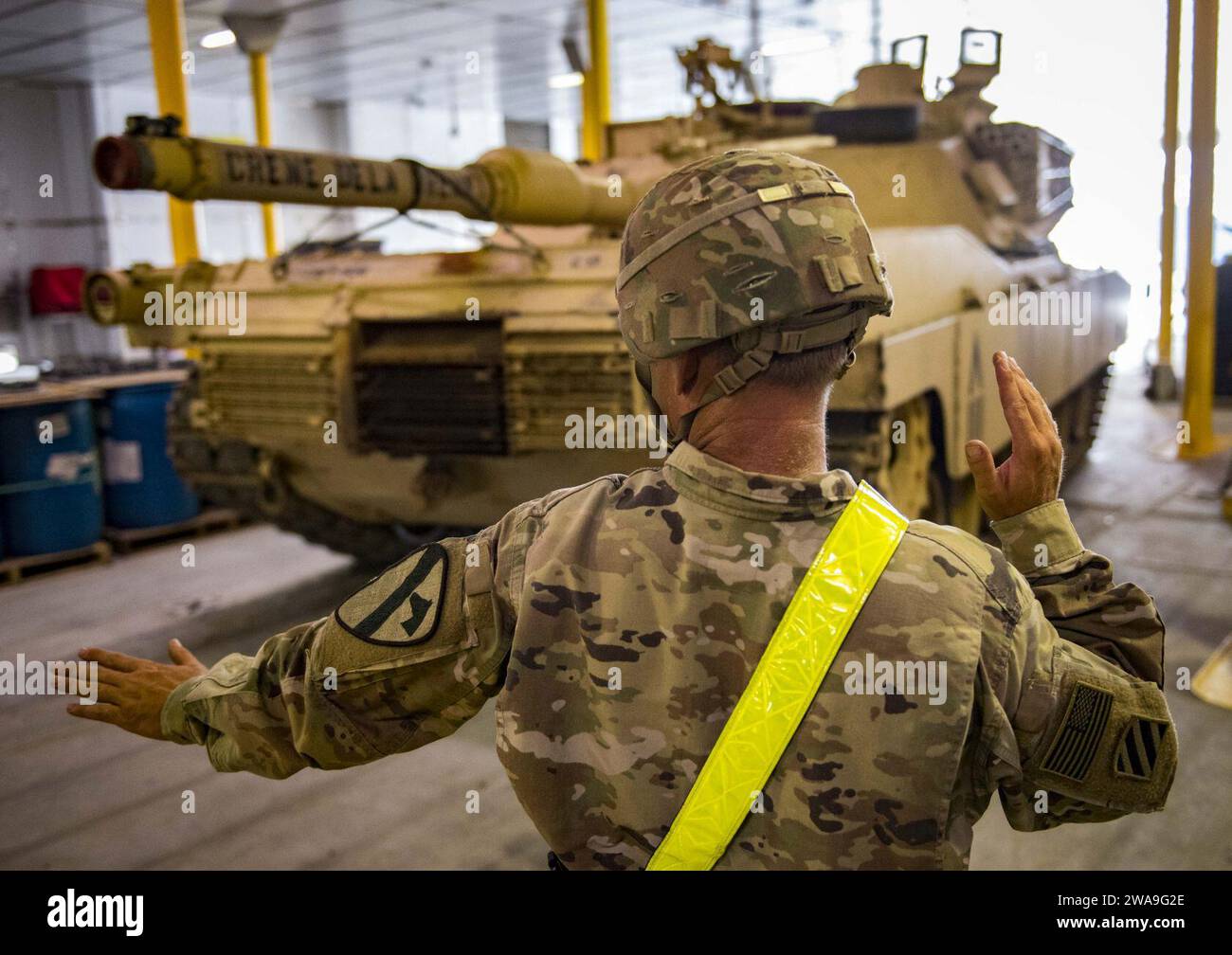 US military forces. POTI, Georgia (Aug. 22, 2018) A U.S. Army Soldier assigned to Bravo Company, 2nd Battalion, 5th Cavalry Regiment, 1st Armored Brigade Combat Team, 1st Cavalry Division, directs an M88 HERCULES Recovery Vehicle aboard the Spearhead-class expeditionary fast transport ship USNS Carson City (T-EPF 7) in Poti, Georgia, Aug. 22, 2018. Carson City is the seventh of nine expeditionary fast transport ships in Military Sealift Command's inventory with a primary mission of providing rapid transport of military equipment and personnel in theater via its 20,000 square foot reconfigurabl Stock Photo