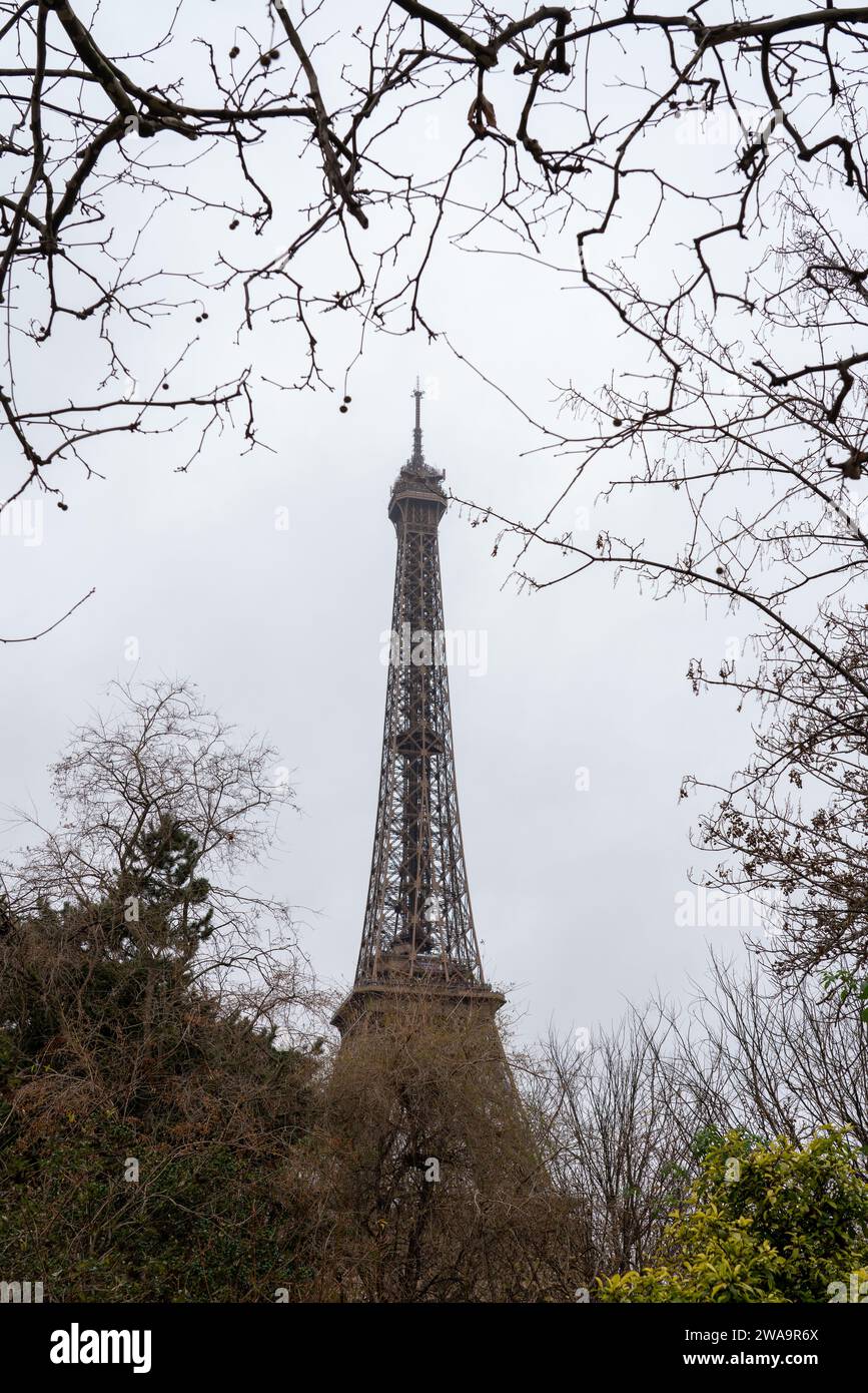 Then Eiffel in Paris in the park whit trees Stock Photo