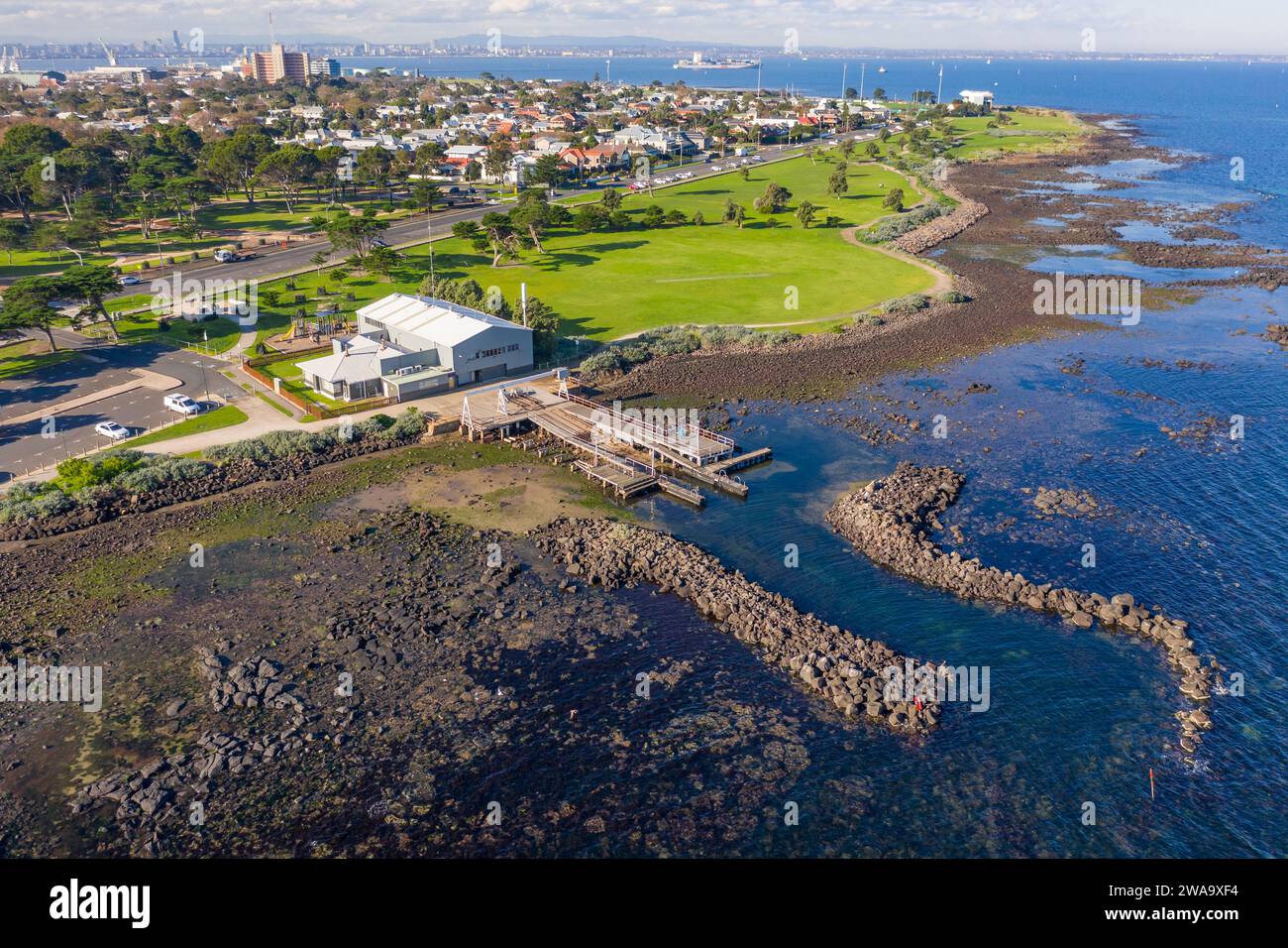 Aerial view of a boat ramp at a coastal angling club alongside green sports grounds  at Williamstown in Melbourne, Victoria, Australia Stock Photo
