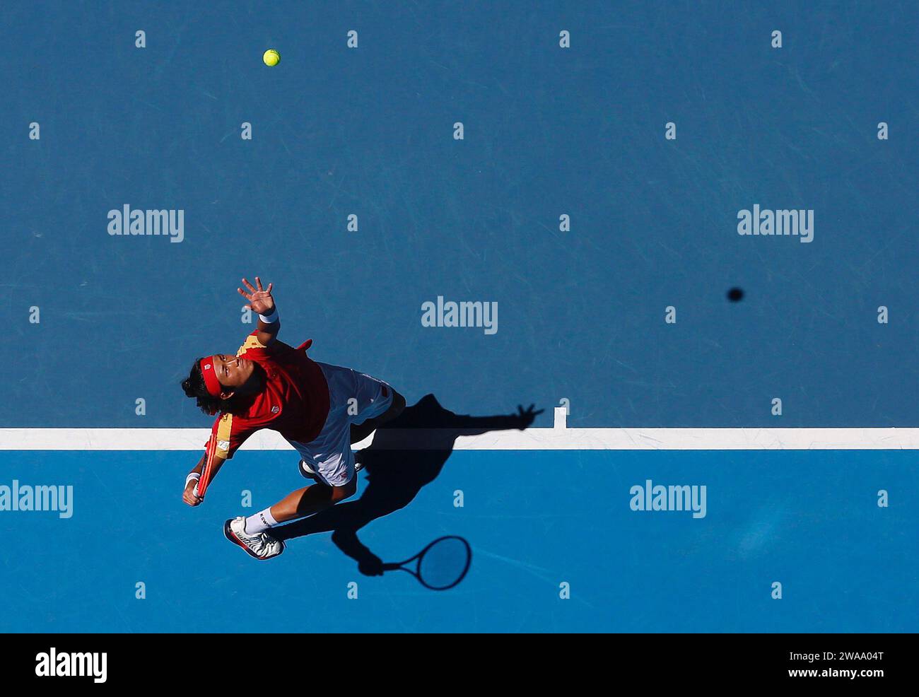 Perth, Australia. 3rd Jan, 2025. Zhang Zhizhen of China serves to