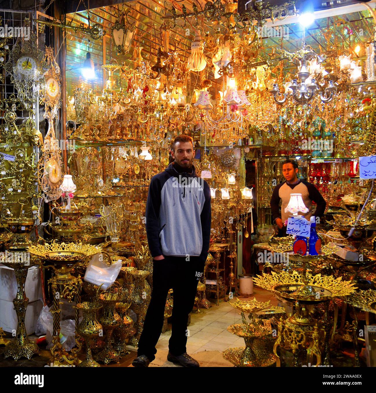 Cool bearded Iran man minding his store at the Grand Bazaar in Tehran, Iran. Storekeeper. Stock Photo