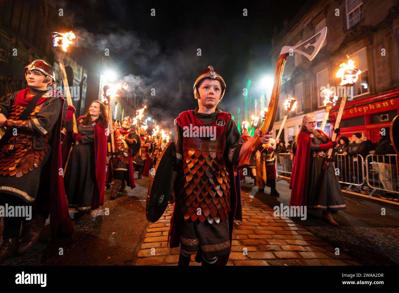 Torchlight procession led by vikings from Shetland’s South Mainland Up Helly Aa’ Jarl Squad during Hogmanay celebrations in Edinburgh, Scotland, 2023 Stock Photo