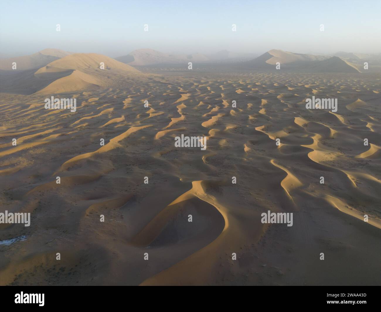 Aerial photo shows the Badain Jaran Desert of Alxa Right Banner, north ...