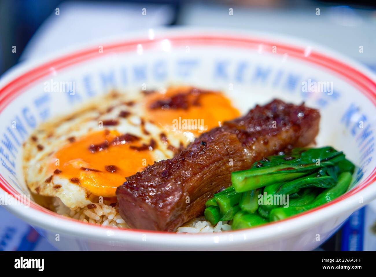 Delicious double egg barbecued pork rice in Hong Kong style tea ...