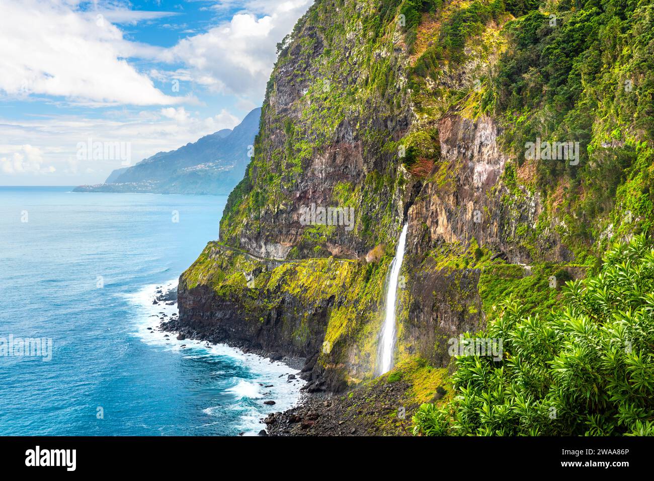 Beautiful View Of Cascata Do Veu Da Noiva Waterfall Near Porto Moniz beautiful-view-of-cascata-do-veu-da-noiva-waterfall-near-porto-moniz