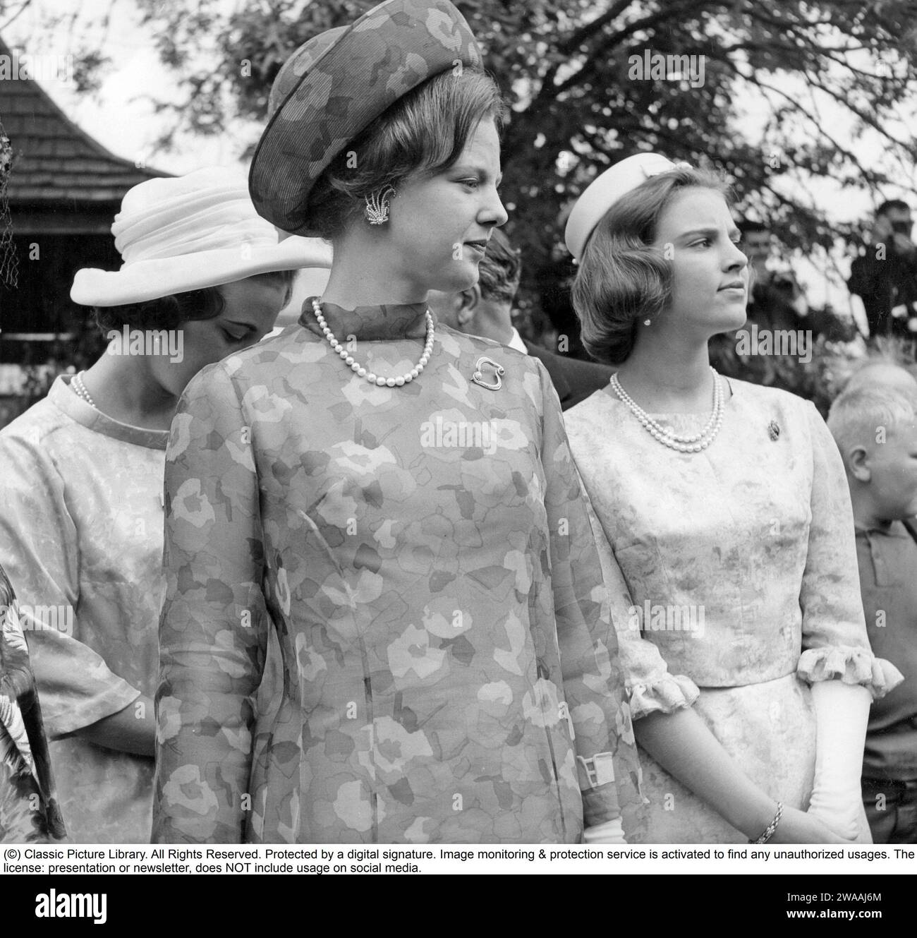Queen Margrethe II of Denmark. Pictured with her sisters Anne-Marie and Benedikte when attending the wedding of swedish princess Margaretha 1964 Stock Photo