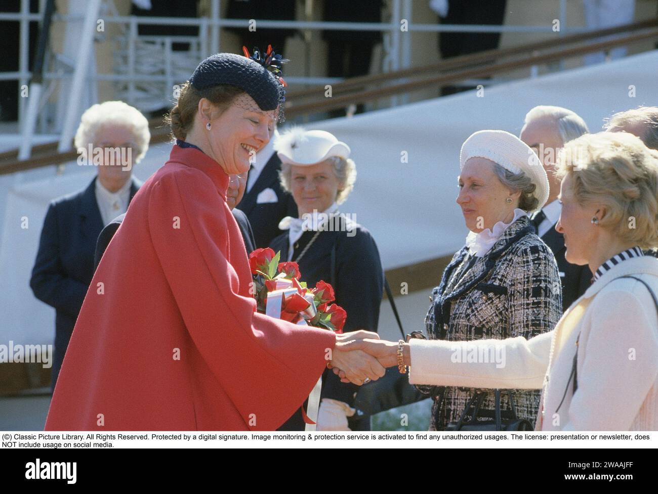 Queen Margrethe II of Denmark. Pictured having traveled to Sweden on the royal ship Dannebrogen and is being greeted welcome. 1985 Stock Photo