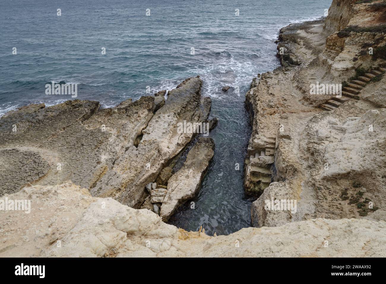 View of the Faraglioni of Torre Sant Andrea limestone sea stacks, Lecce province, Melendugno, Salento, Apulia, Italy Stock Photo