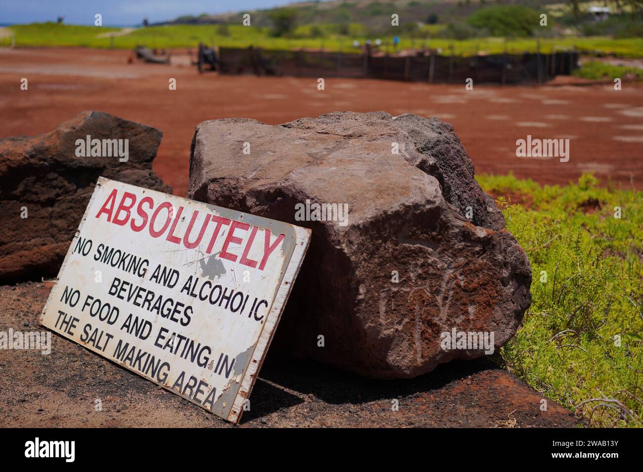 Salt Patch A sign and large boulders mark the edge of the Hanapepe salt patch near ...