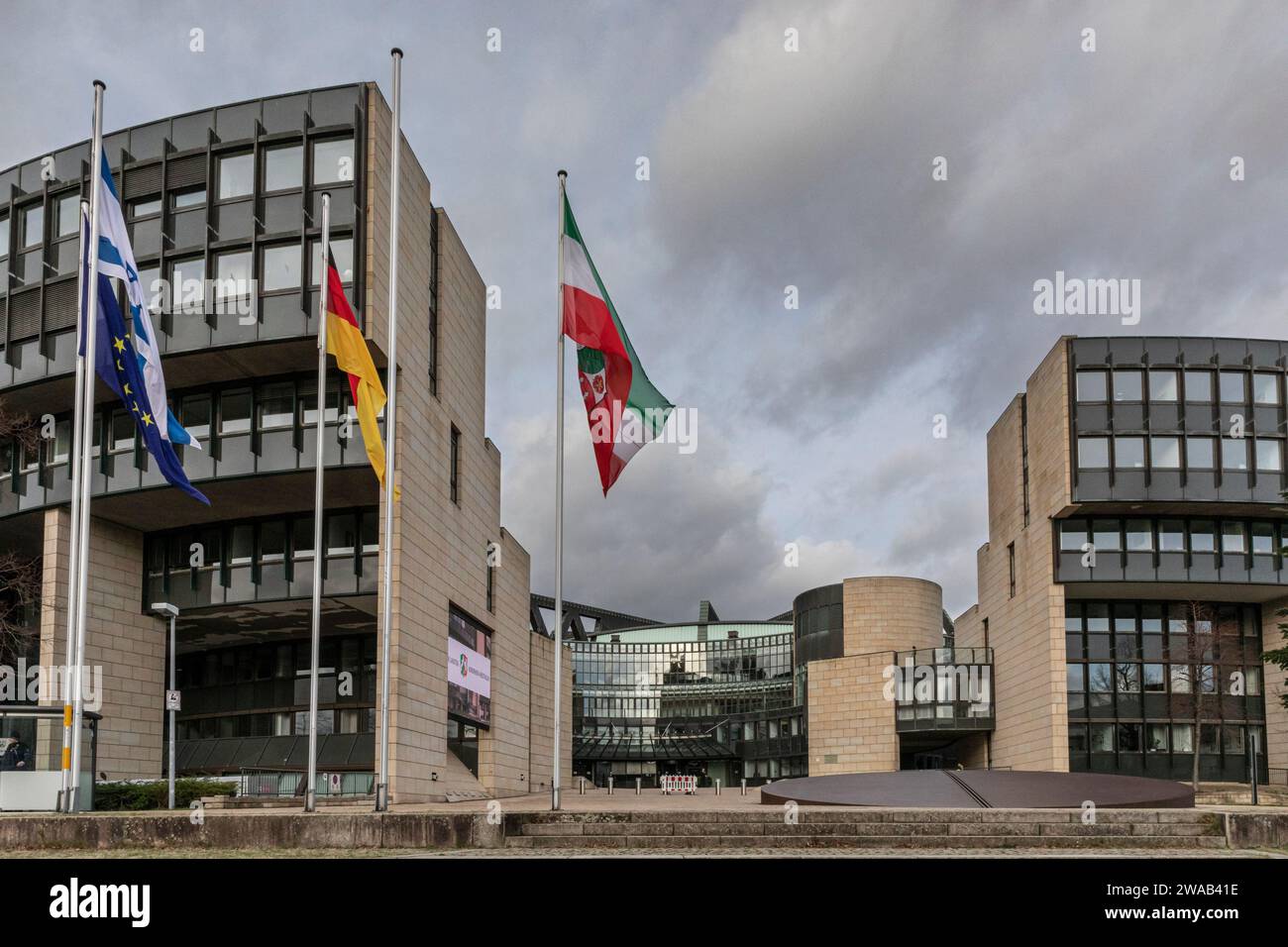 Düsseldorf Landtag, exetrior of  the NRW federal state Parliament with flags, Dusseldorf, Germany Stock Photo