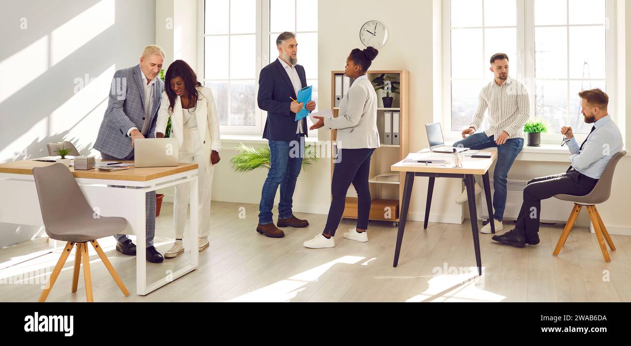 Group of business people working together in office Stock Photo - Alamy