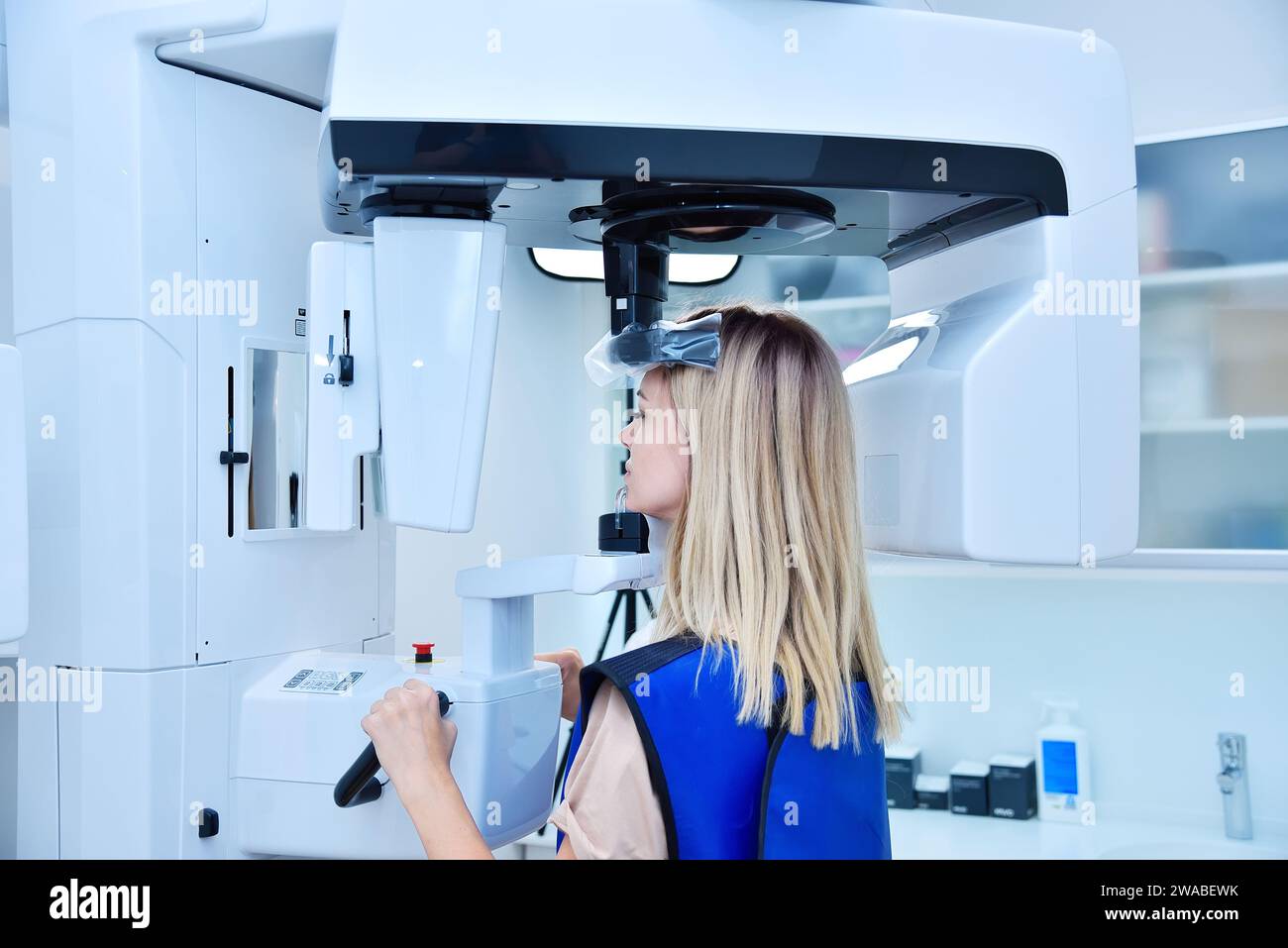 Woman patient make a dental computer tomograph. Dentistry and health care concept. Close up Stock Photo