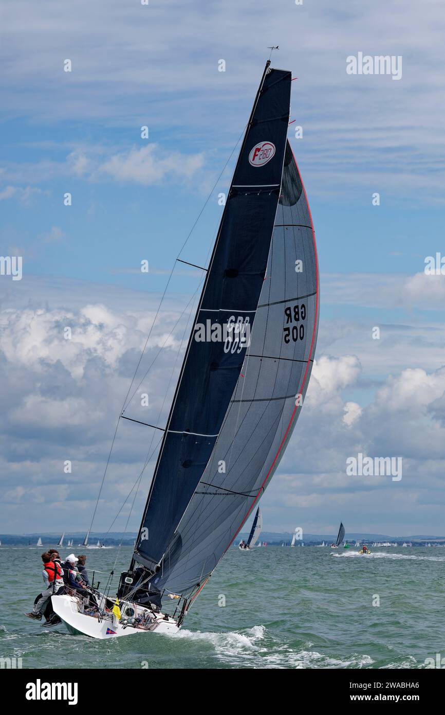 GBR005 Moral Compass a Farr 280 Racing Yacht on her way to first place in her class at the Cowes Week Regatta held in the Solent each summer. Stock Photo