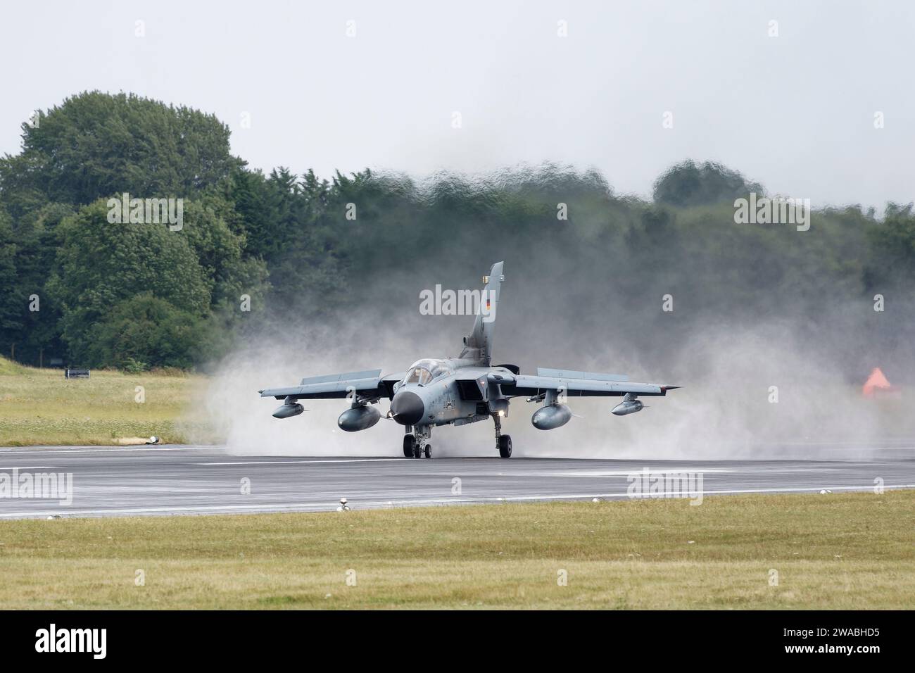 German Air Force Luftwaffe Eurofighter EF2000 Typhoon 4429 from the Taktisches Luftwaffengeschwader 33 lands on a wet Fairford Runway at the RIAT Stock Photo