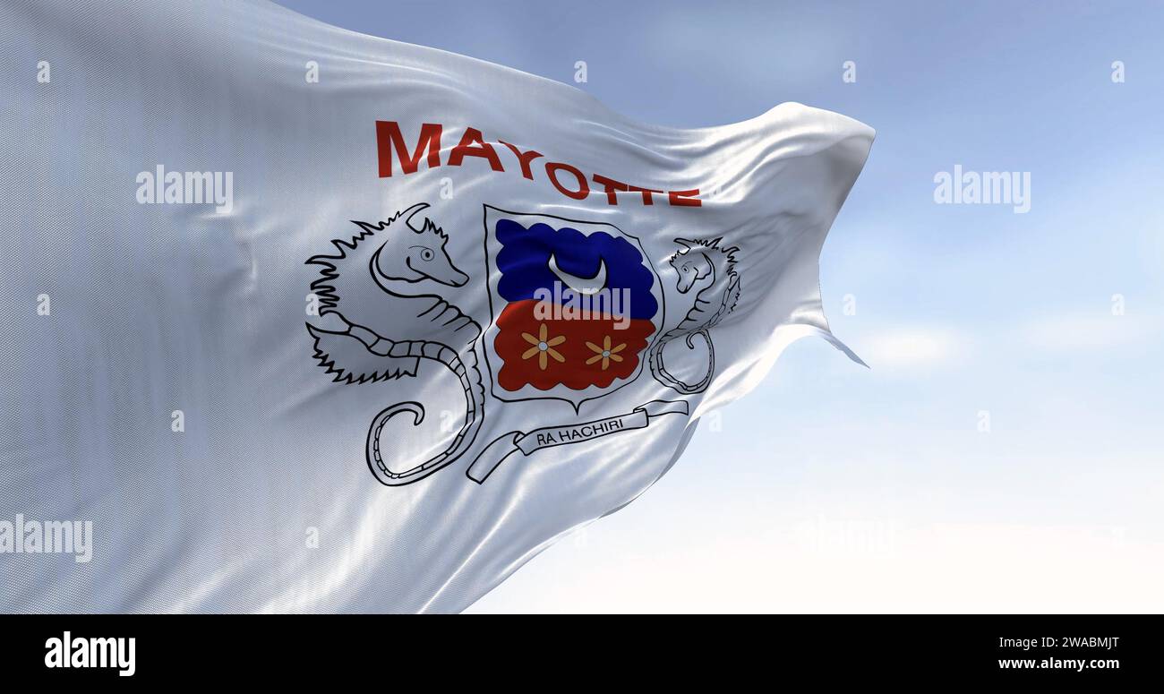 Flag of Mayotte waving in the wind on a clear day. Overseas department and region of France. 3d illustration render. Fluttering fabric. Stock Photo