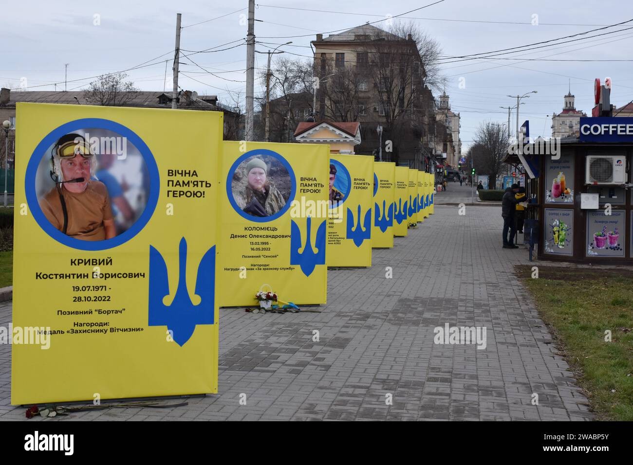 View of stands of portraits of fallen Ukrainian soldiers seen at the center of Zaporizhzhia. Ukrainian President Volodymyr Zelenskiy said Russian forces are suffering heavy losses and the notion that Moscow is winning the nearly two-year-old war is only a 'feeling' not based on reality. There was no response to a request for comment from Russian officials on Zelenskiy's remarks. Russian officials have said Western estimates of Russian death tolls are vastly exaggerated and almost always underestimate Ukrainian losses. Stock Photo