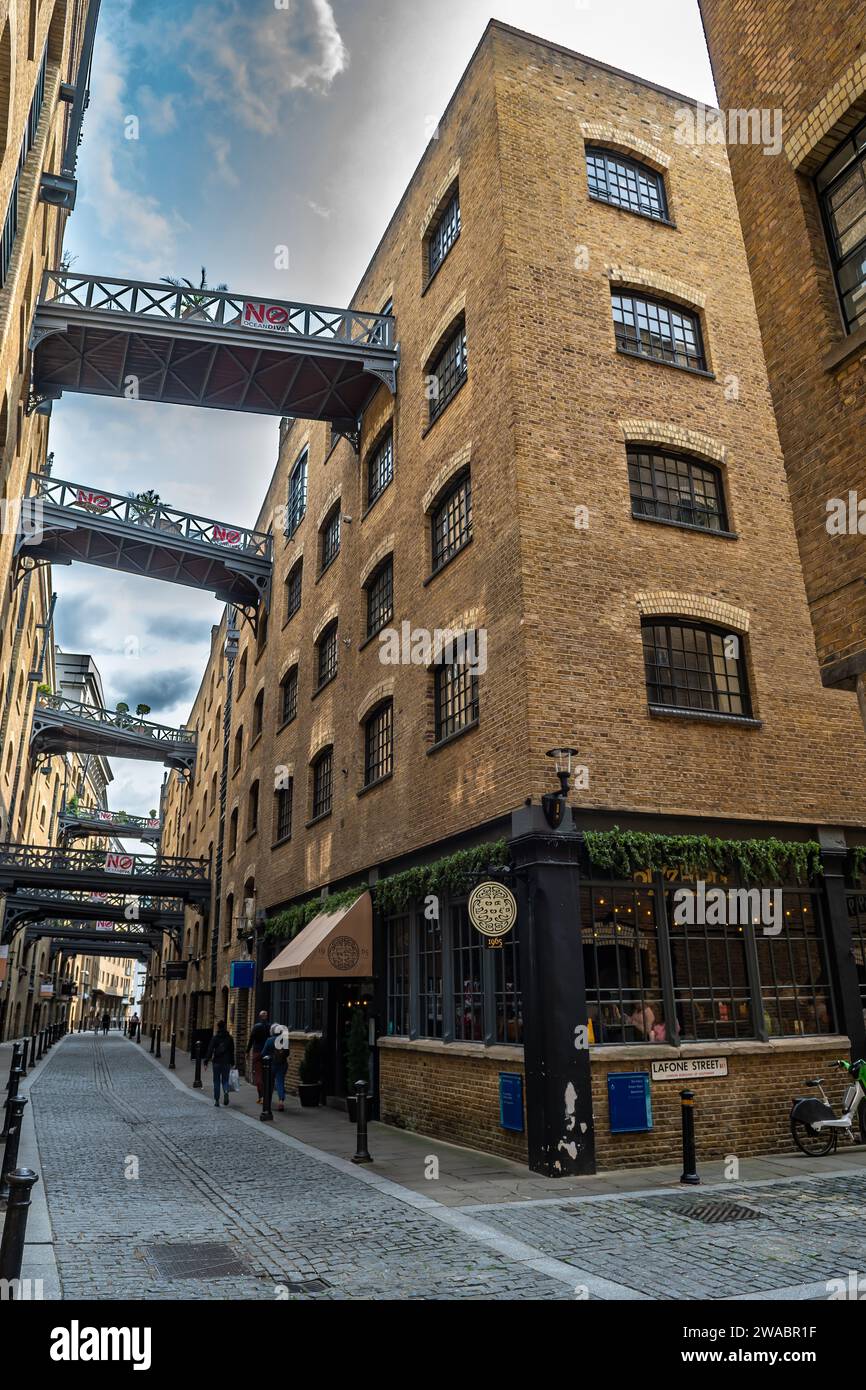 Shad Thames Buildings And Luxury Apartments With Cobblestone Alley Near