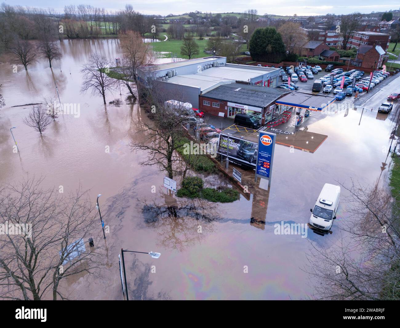 At the start of 2024 Storm Henk saw large parts of the Midlands under water after severe flooding. Pictured, A stranded vehicle leaks oil into the nearby River Anker in the village of Polesworth, North Warwickshire where vehicles had become trapped in the deep water. Stock Photo