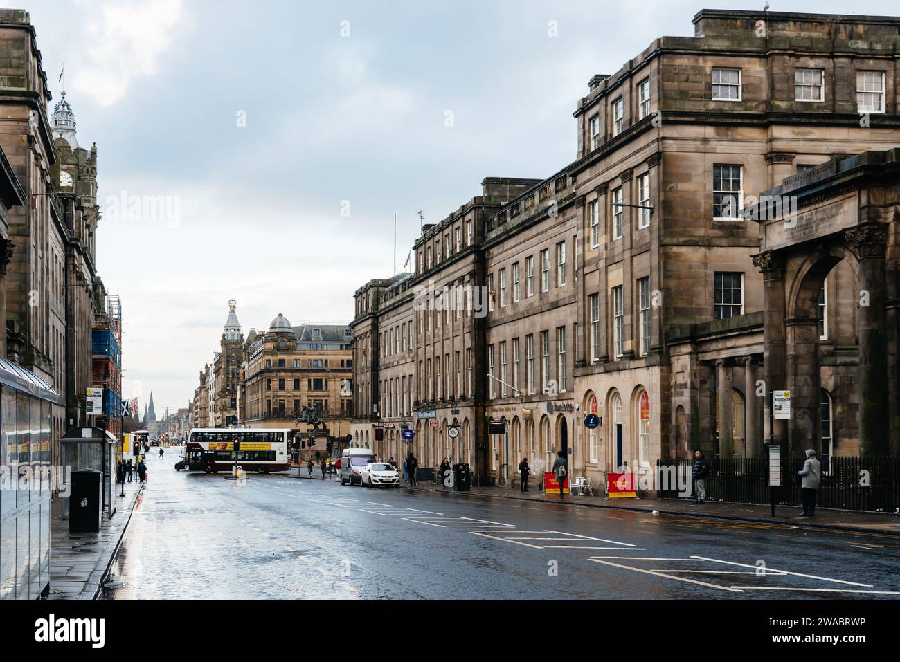 Edinburgh, UK - December 5, 2023: Princess Street during Christmas time a rainy day Stock Photo